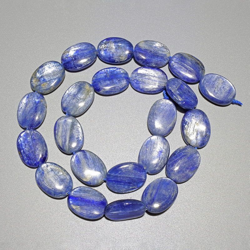 Kyanite beads, natural stone, oval, diameter 12×16 mm ±, length 40 cm ± on a thread